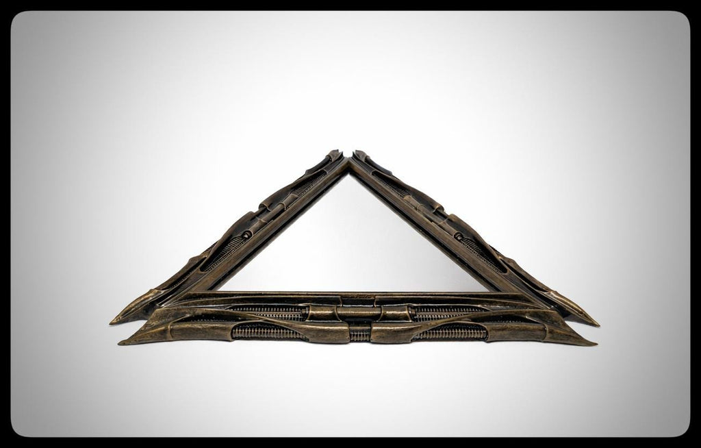 Inspired by H.R. Giger -Mirror Triangular 1983 H 11.02" (28 cm/280 mm) W 12.99" (33 cm/330 mm)