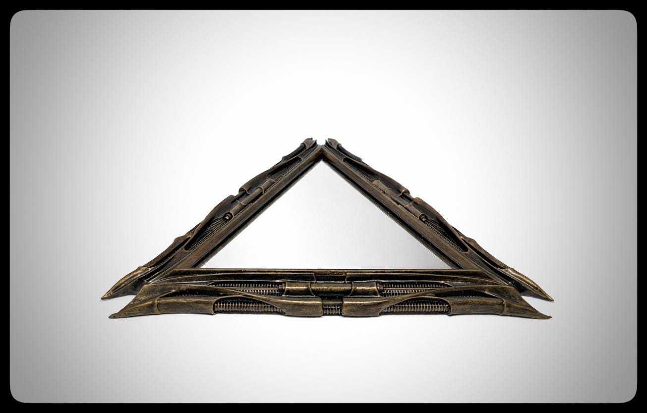 Inspired by H.R. Giger -Mirror Triangular 1983 H 11.02" (28 cm/280 mm) W 12.99" (33 cm/330 mm)