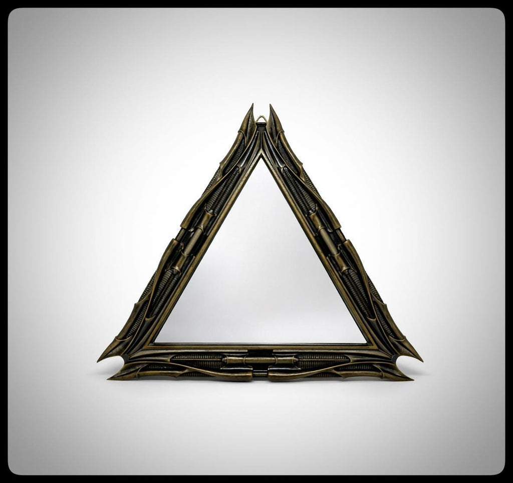 Inspired by H.R. Giger -Mirror Triangular 1983 H 11.02" (28 cm/280 mm) W 12.99" (33 cm/330 mm)